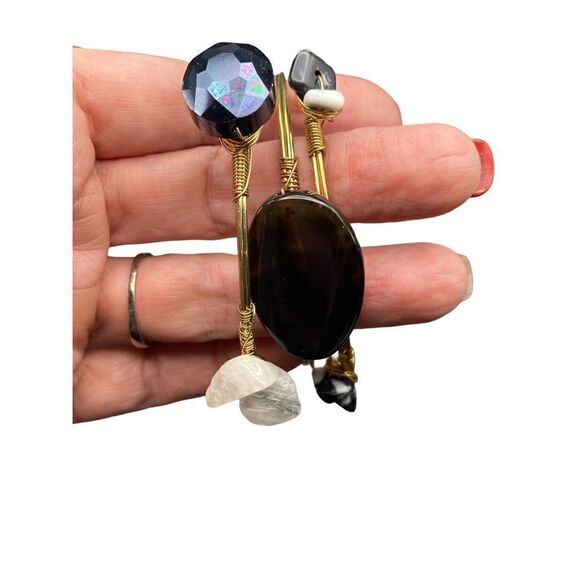 Black and gold tone wire-wrapped bangles adorned with black and white stones set - Picture 3 of 8